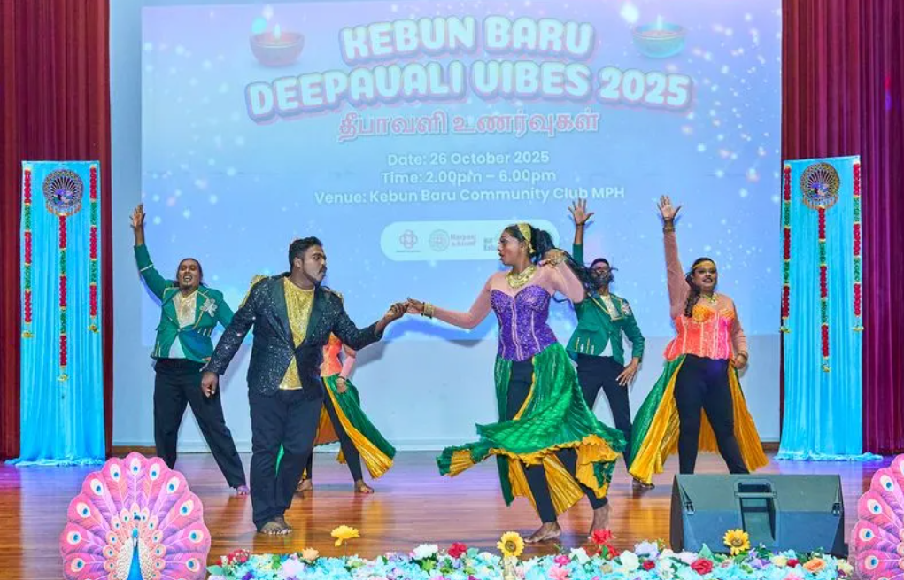 Performers took to the stage with vibrant dance performances during the Deepavali Vibes celebration at Kebun Baru Community Club.Enter a descriptive alt text.